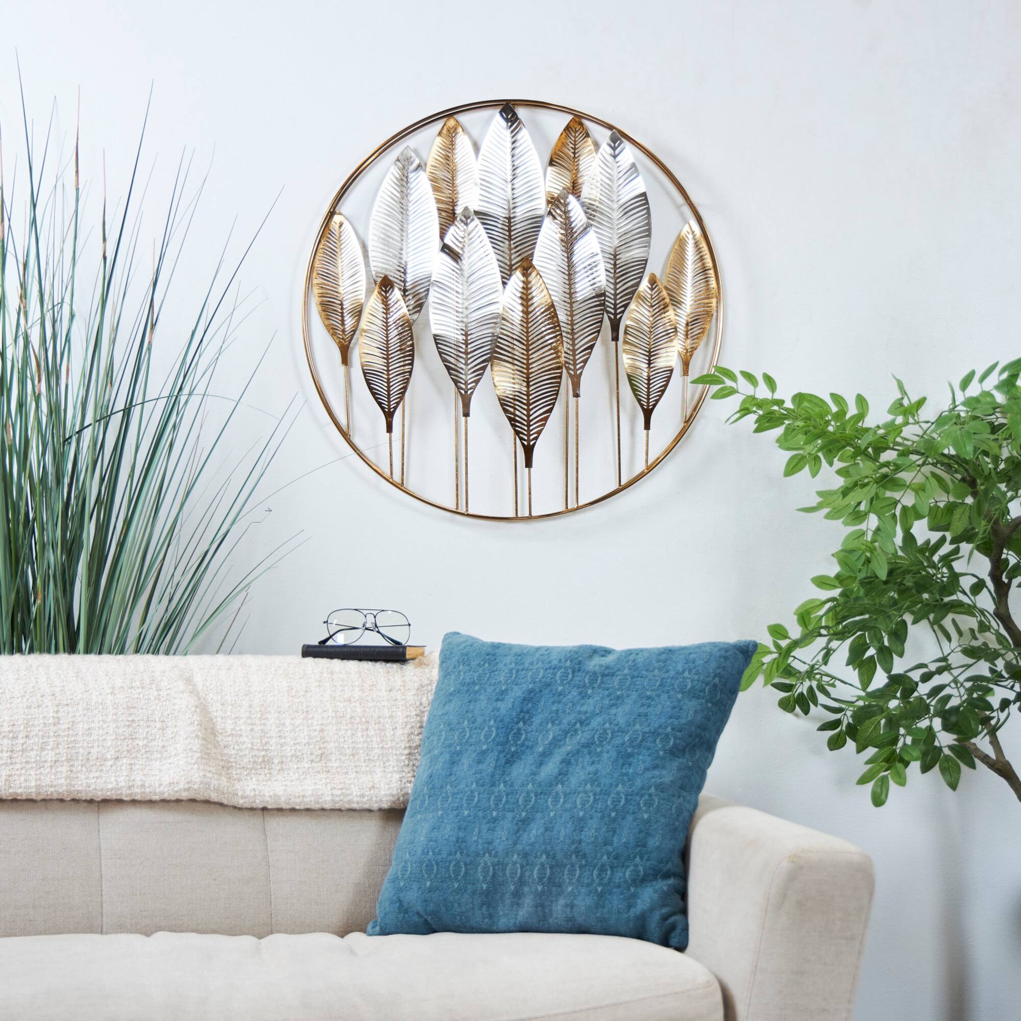 Gold Metal Leaf Wall Décor with Circular Frame and Silver Accents